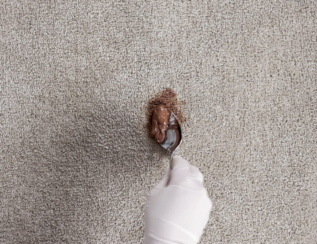 Scraping chocolate off carpet