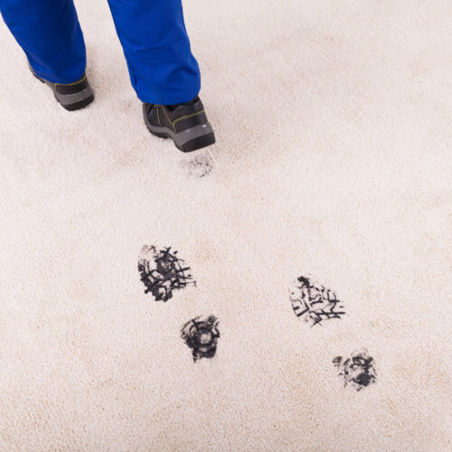 Oil foot prints on carpet